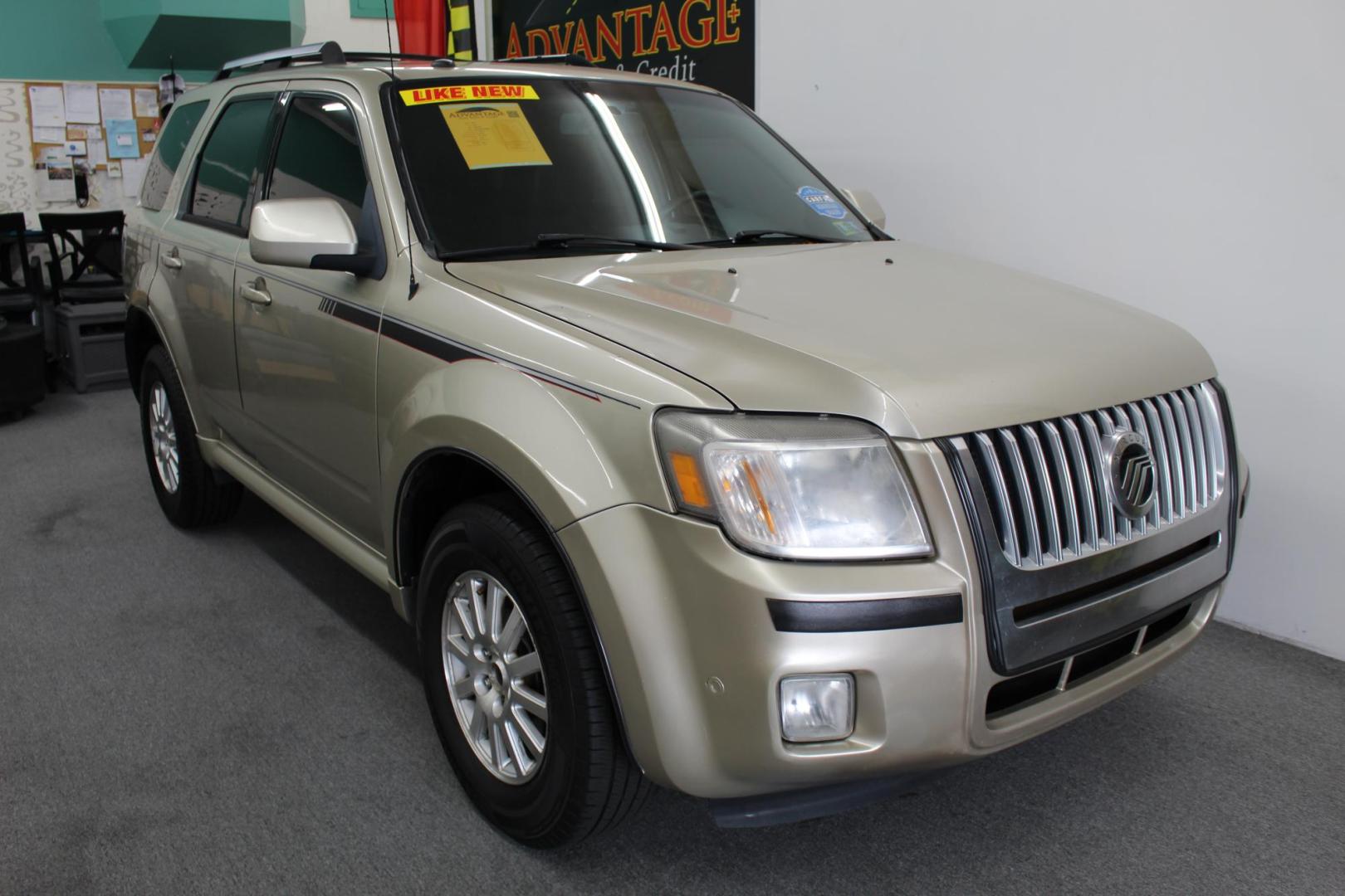 2010 GOLD /Gray Mercury Mariner Premier I4 4WD (4M2CN9H7XAK) with an 2.5L L4 DOHC 16V engine, 6-Speed Automatic transmission, located at 533 S West End Blvd., Quakertown, PA, 18951, (877) 257-4995, 40.343994, -75.303604 - INCLUDED IN THE SALE PRICE OF EVERY VEHICLE: 48 Hour Money Back Guarantee 6 Month - 6,000 Mile Warranty Brand New PA State Inspection & Emission $10 Oil Changes for the Life of the Loan Complete CARFAX - Photo#2