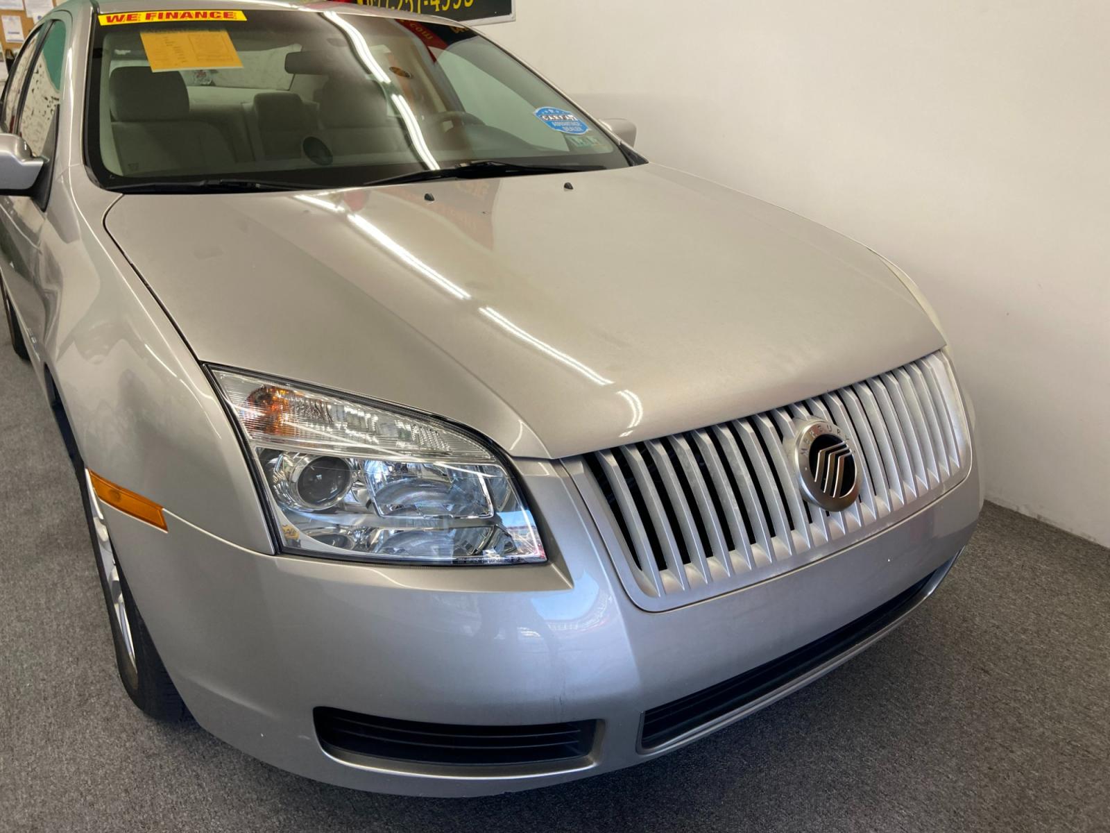 2007 SILVER Mercury Milan V6 AWD (3MEHM01197R) with an 3.0L V6 DOHC 24V engine, 6-Speed Automatic Overdrive transmission, located at 533 S West End Blvd., Quakertown, PA, 18951, (877) 257-4995, 40.343994, -75.303604 - INCLUDED IN THE SALE PRICE OF EVERY VEHICLE: 48 Hour Money Back Guarantee 6 Month - 6,000 Mile Warranty Brand New PA State Inspection & Emission $10 Oil Changes for the Life of the Loan Complete CARFAX - Photo #1