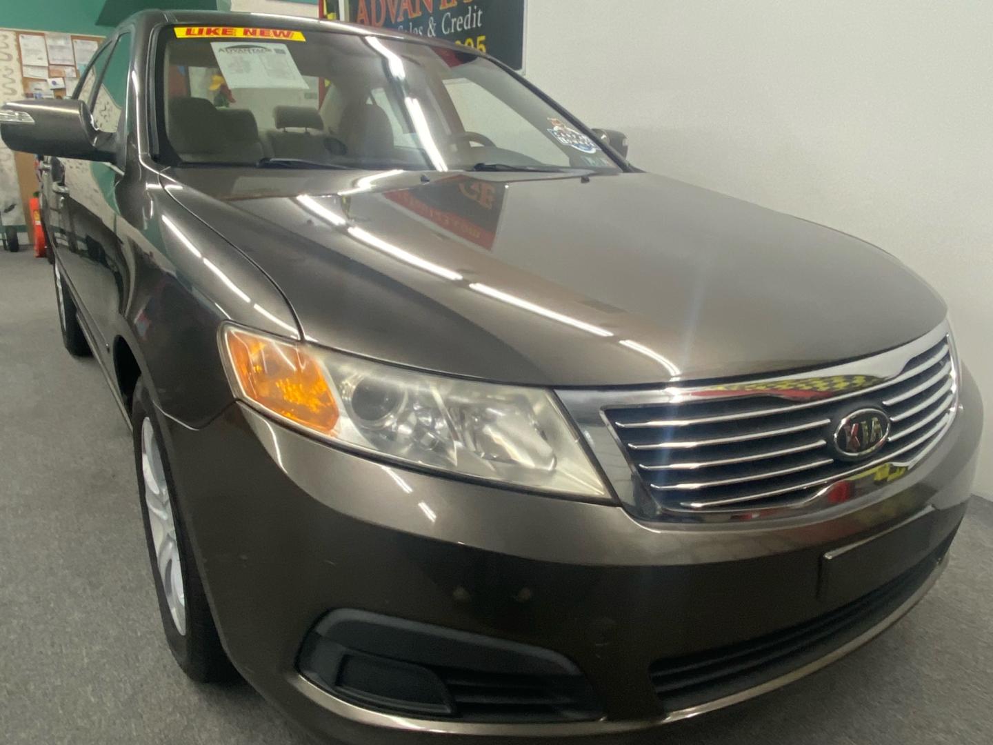 2009 Brown /Tan Kia Optima (KNAGE228595) , located at 533 S West End Blvd., Quakertown, PA, 18951, (877) 257-4995, 40.343994, -75.303604 - INCLUDED IN THE SALE PRICE OF EVERY VEHICLE: 48 Hour Money Back Guarantee 6 Month - 6,000 Mile Warranty Brand New PA State Inspection & Emission $10 Oil Changes for the Life of the Loan Complete CARFAX - Photo#2