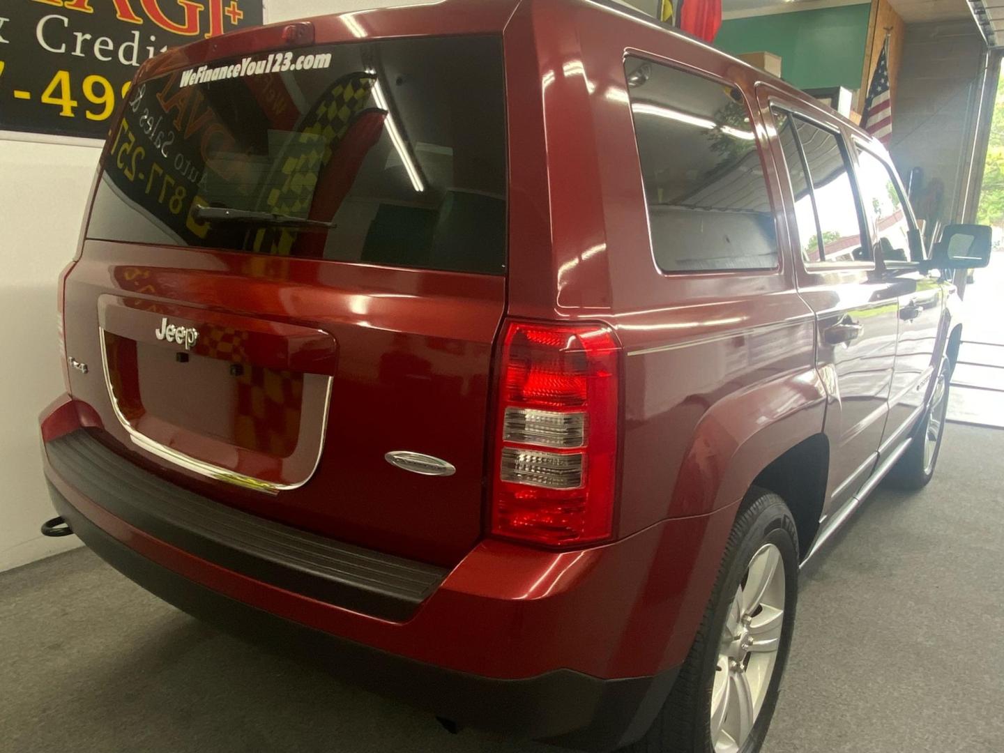 2013 RED /Tan Jeep Patriot Latitude 4WD (1C4NJRFB1DD) with an 2.4L L4 DOHC 16V engine, located at 533 S West End Blvd., Quakertown, PA, 18951, (877) 257-4995, 40.343994, -75.303604 - INCLUDED IN THE SALE PRICE OF EVERY VEHICLE: 48 Hour Money Back Guarantee 6 Month - 6,000 Mile Warranty Brand New PA State Inspection & Emission $10 Oil Changes for the Life of the Loan Complete CARFAX - Photo#3
