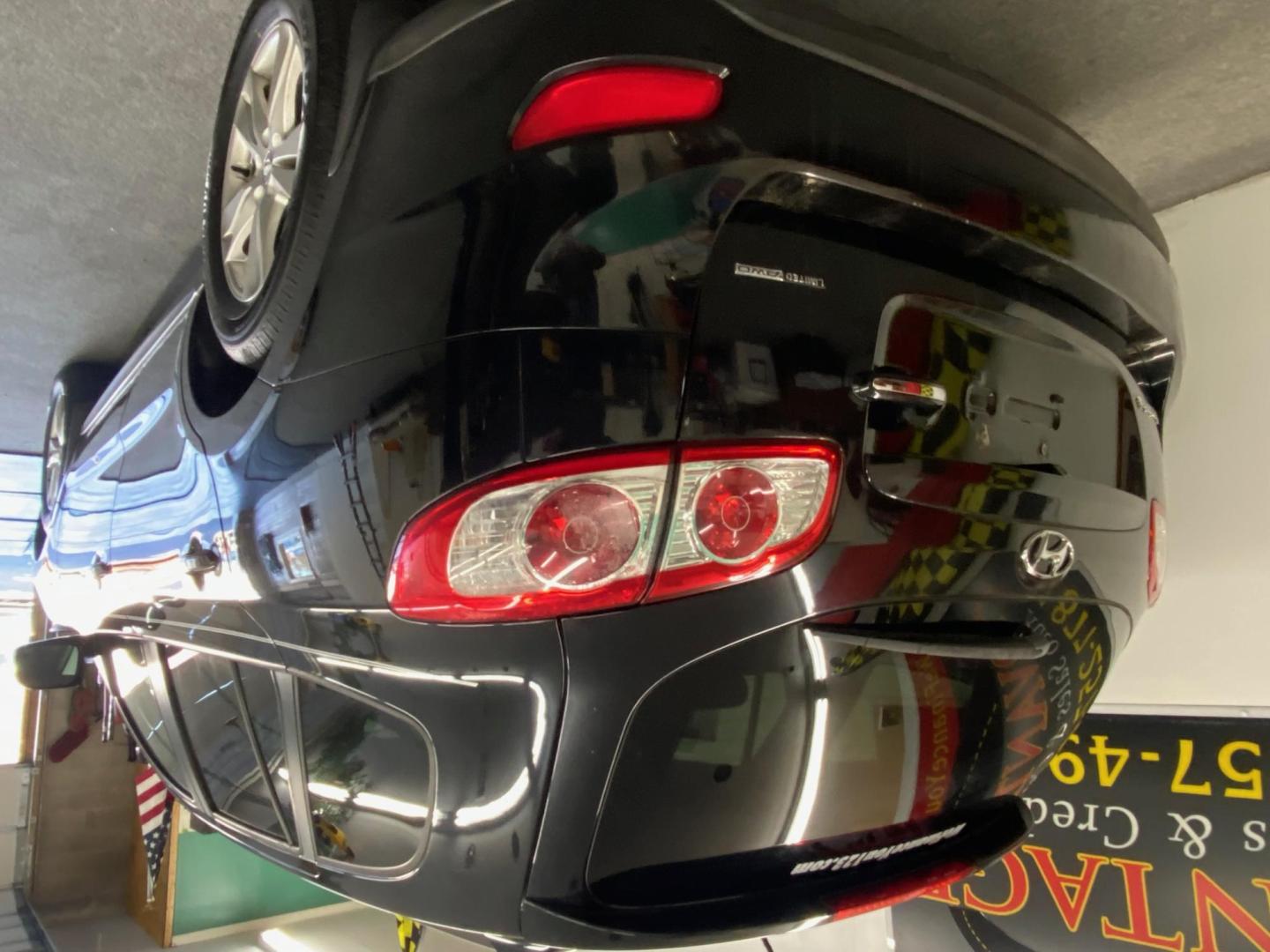 2012 BLACK /BLACK Hyundai Santa Fe Limited 3.5 4WD (5XYZKDAG9CG) with an 3.5L V6 DOHC 24V engine, 6-Speed Automatic transmission, located at 533 S West End Blvd., Quakertown, PA, 18951, (877) 257-4995, 40.343994, -75.303604 - INCLUDED IN THE SALE PRICE OF EVERY VEHICLE: 48 Hour Money Back Guarantee 6 Month - 6,000 Mile Warranty Brand New PA State Inspection & Emission $10 Oil Changes for the Life of the Loan Complete CARFAX - Photo#3