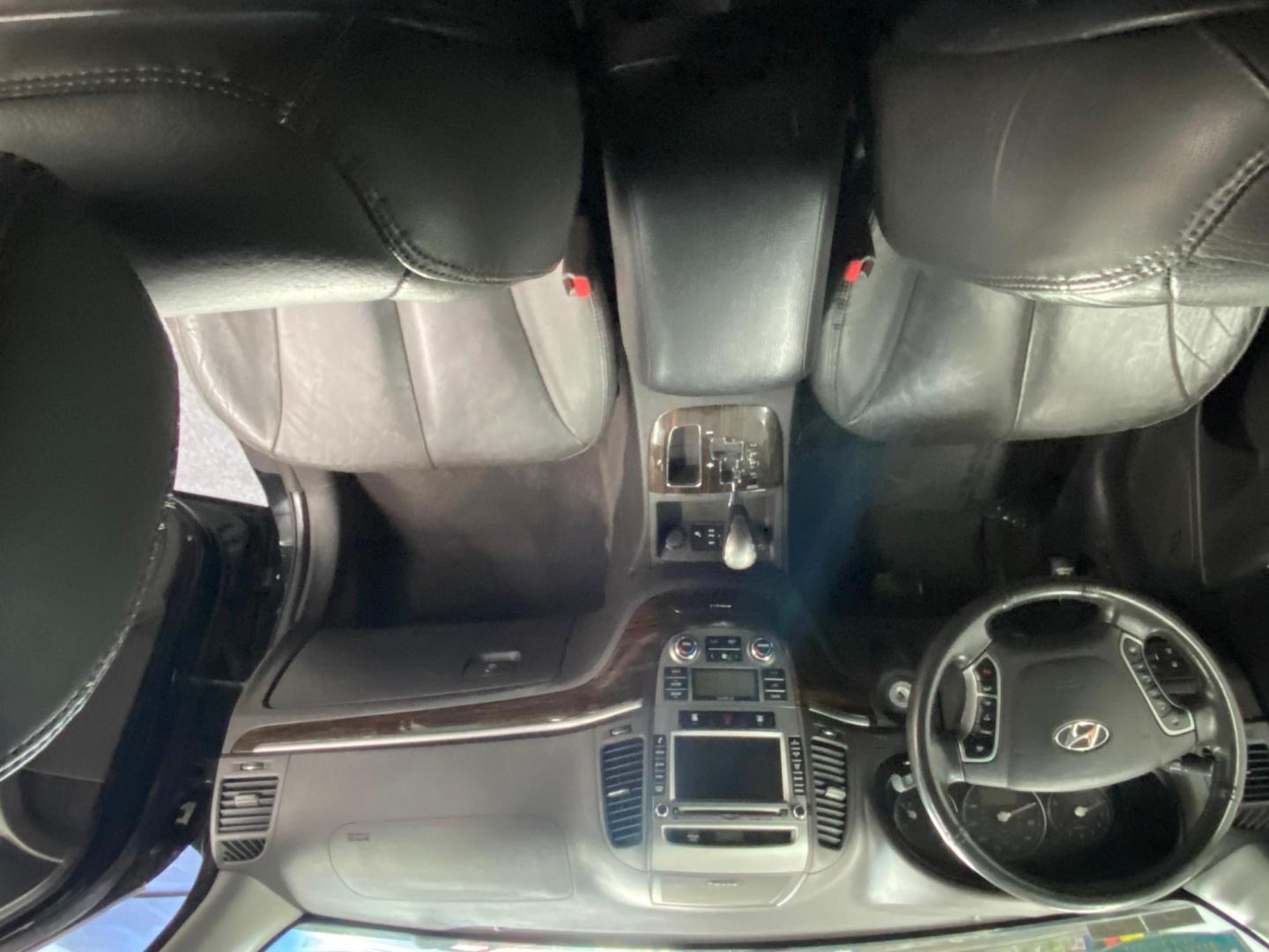 2012 BLACK /BLACK Hyundai Santa Fe Limited 3.5 4WD (5XYZKDAG9CG) with an 3.5L V6 DOHC 24V engine, 6-Speed Automatic transmission, located at 533 S West End Blvd., Quakertown, PA, 18951, (877) 257-4995, 40.343994, -75.303604 - INCLUDED IN THE SALE PRICE OF EVERY VEHICLE: 48 Hour Money Back Guarantee 6 Month - 6,000 Mile Warranty Brand New PA State Inspection & Emission $10 Oil Changes for the Life of the Loan Complete CARFAX - Photo#5