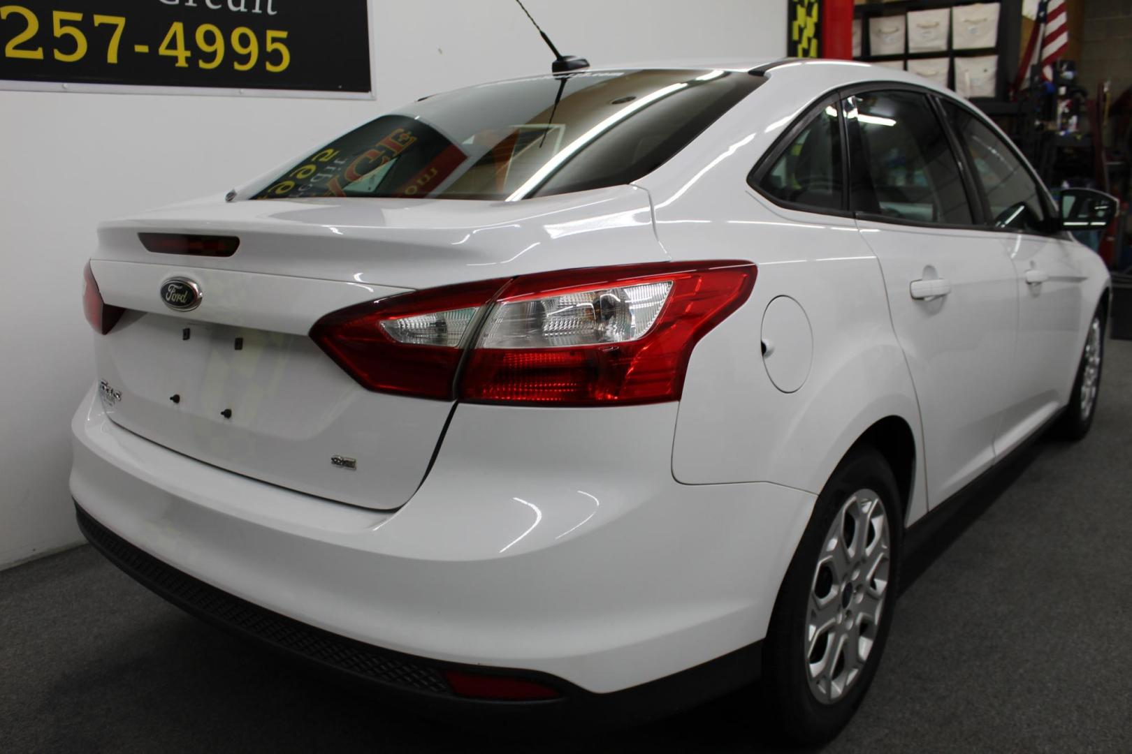 2012 WHITE /GRAY Ford Focus SE Sedan (1FAHP3F22CL) with an 2.0L L4 DOHC 16V engine, located at 533 S West End Blvd., Quakertown, PA, 18951, (877) 257-4995, 40.343994, -75.303604 - INCLUDED IN THE SALE PRICE OF EVERY VEHICLE: 48 Hour Money Back Guarantee 6 Month - 6,000 Mile Warranty Brand New PA State Inspection & Emission $10 Oil Changes for the Life of the Loan Complete CARFAX - Photo#3