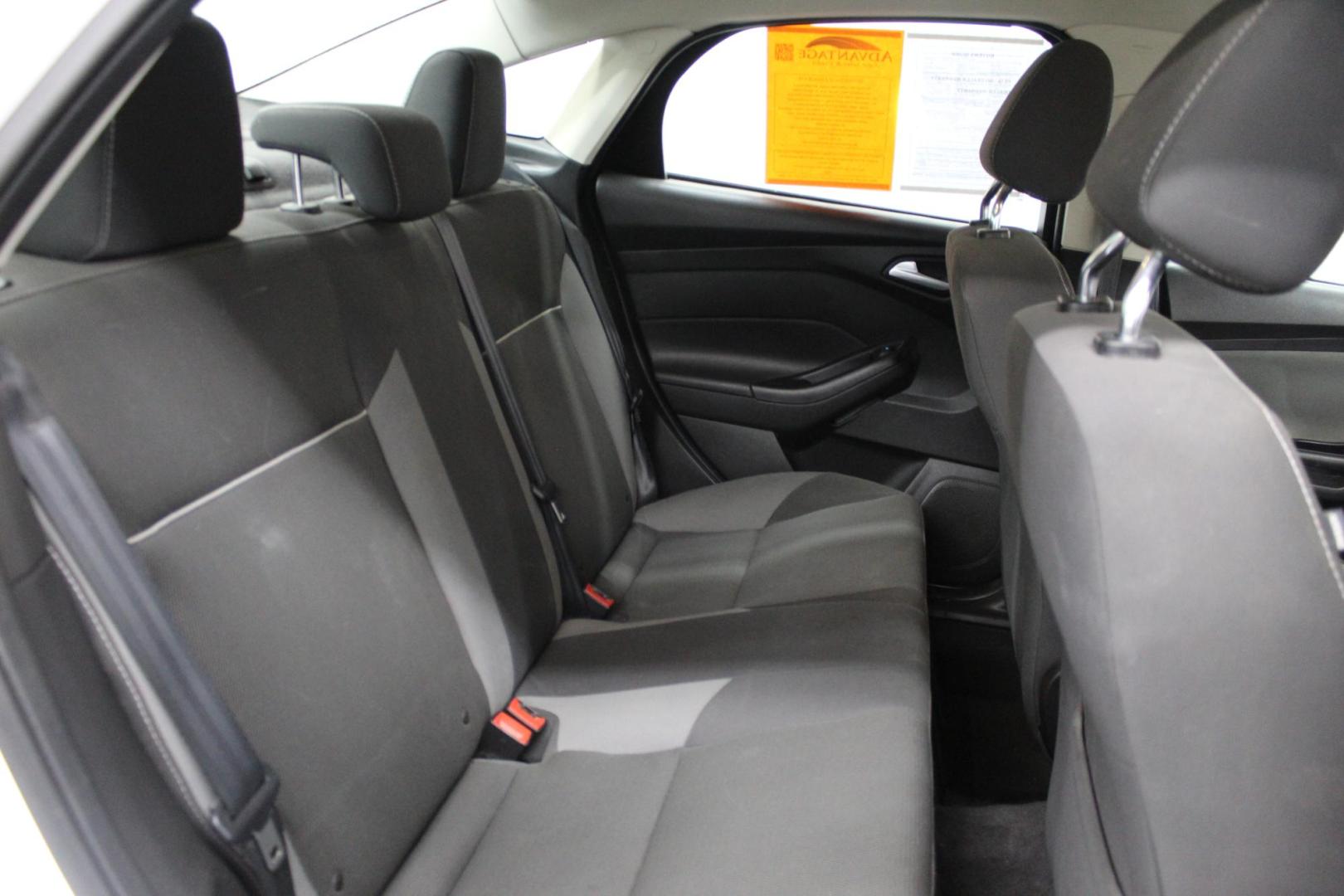 2012 WHITE /GRAY Ford Focus SE Sedan (1FAHP3F22CL) with an 2.0L L4 DOHC 16V engine, located at 533 S West End Blvd., Quakertown, PA, 18951, (877) 257-4995, 40.343994, -75.303604 - INCLUDED IN THE SALE PRICE OF EVERY VEHICLE: 48 Hour Money Back Guarantee 6 Month - 6,000 Mile Warranty Brand New PA State Inspection & Emission $10 Oil Changes for the Life of the Loan Complete CARFAX - Photo#4