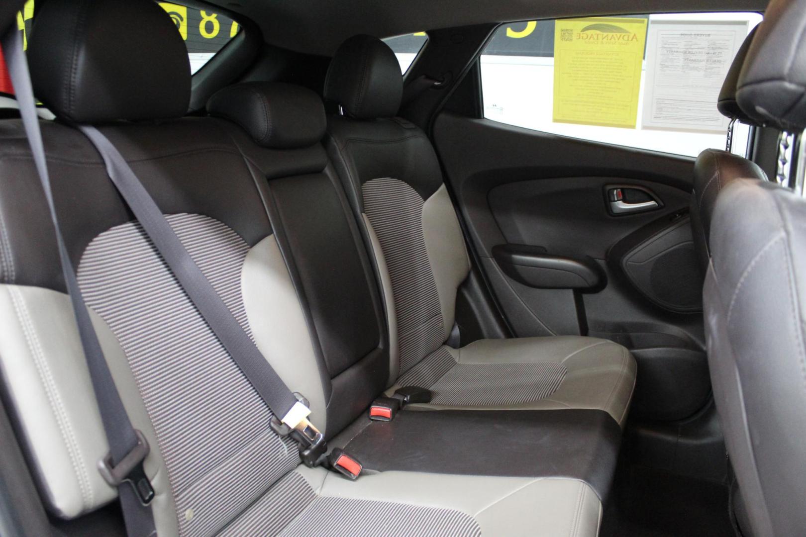 2012 Blue /GRAY Hyundai Tucson Limited Auto AWD (KM8JUCAC3CU) with an 2.4L L4 DOHC 16V engine, 6-Speed Automatic transmission, located at 533 S West End Blvd., Quakertown, PA, 18951, (877) 257-4995, 40.343994, -75.303604 - INCLUDED IN THE SALE PRICE OF EVERY VEHICLE: 48 Hour Money Back Guarantee 6 Month - 6,000 Mile Warranty Brand New PA State Inspection & Emission $10 Oil Changes for the Life of the Loan Complete CARFAX - Photo#4