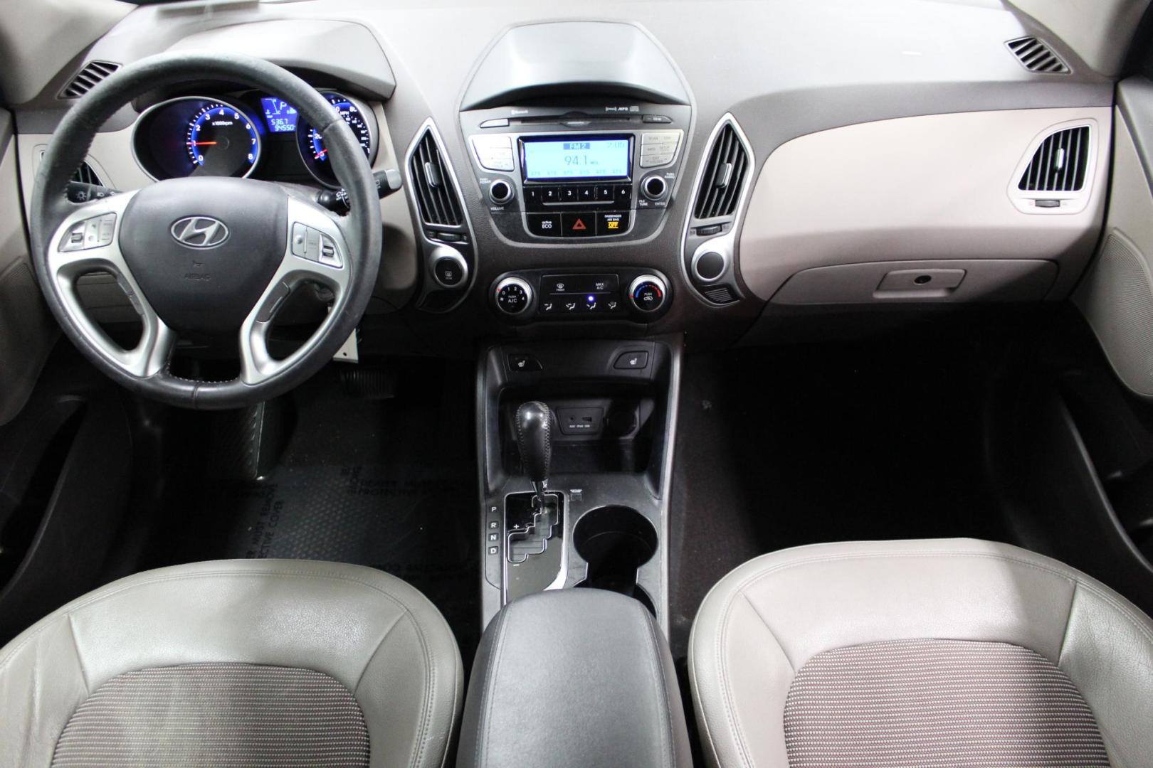 2012 Blue /GRAY Hyundai Tucson Limited Auto AWD (KM8JUCAC3CU) with an 2.4L L4 DOHC 16V engine, 6-Speed Automatic transmission, located at 533 S West End Blvd., Quakertown, PA, 18951, (877) 257-4995, 40.343994, -75.303604 - INCLUDED IN THE SALE PRICE OF EVERY VEHICLE: 48 Hour Money Back Guarantee 6 Month - 6,000 Mile Warranty Brand New PA State Inspection & Emission $10 Oil Changes for the Life of the Loan Complete CARFAX - Photo#6