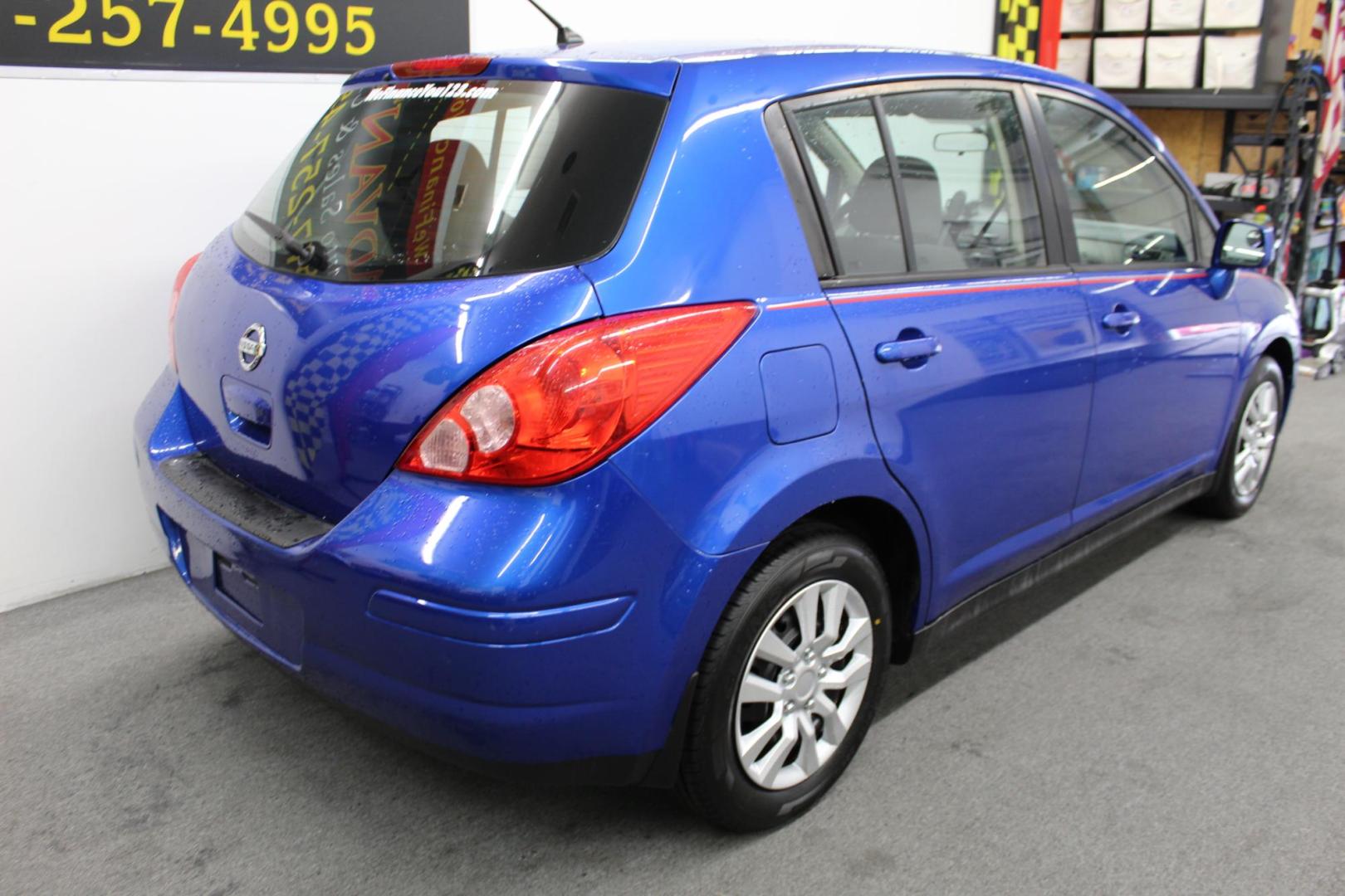 2012 Blue /Black Nissan Versa 1.8 SL Hatchback (3N1BC1CP3CK) with an 1.8L L4 DOHC 16V engine, Continuously Variable Transmission transmission, located at 533 S West End Blvd., Quakertown, PA, 18951, (877) 257-4995, 40.343994, -75.303604 - INCLUDED IN THE SALE PRICE OF EVERY VEHICLE: 48 Hour Money Back Guarantee 6 Month - 6,000 Mile Warranty Brand New PA State Inspection & Emission $10 Oil Changes for the Life of the Loan Complete CARFAX - Photo#3
